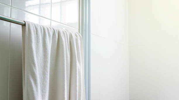 istock White towel hanging in a bathroom. 978271442