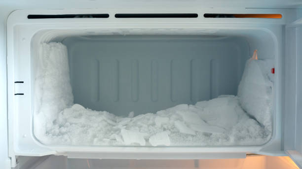 Ice buildup in an empty refrigerator. Ice buildup in an empty refrigerator. fridge frost stock pictures, royalty-free photos & images