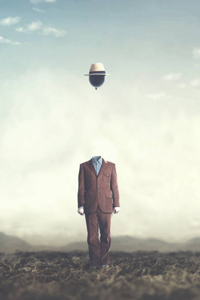 istock surreal minimalist man with big black balloon suspended over his head 978274182