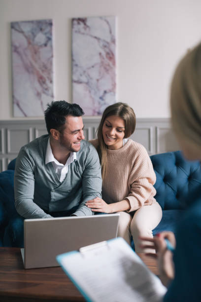 family meeting real-estate agent for house investment. - family insurance agent real estate financial advisor imagens e fotografias de stock