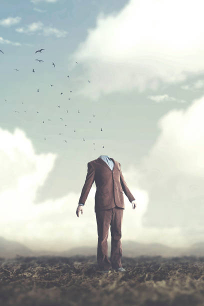 istock birds flying out from man without head surreal concept 978274446
