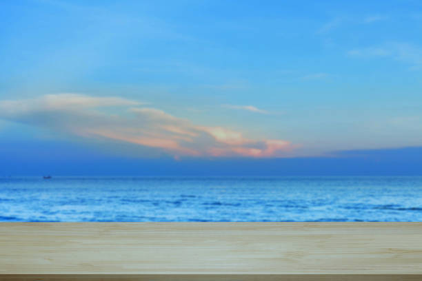 istock wood walk or terrace over sea with sun ray background. 978285918