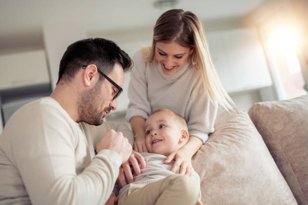 istock Cheerful young family having great time 978292344