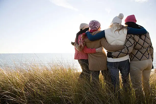 Photo of Female friends by the sea