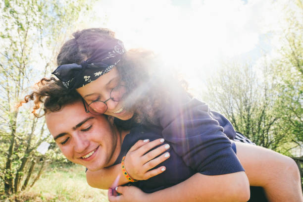 istock Happy young couple enjoying sunset 978304774