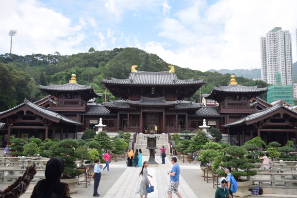 View of Chi Lin nunnery buddhist temple in Diamond Hill, Hong Kong - China Hong Kong, China - June 18, 2018 - The complex was founded in 1934 as a retreat for Buddhist nuns and was rebuilt in the 1990s following the traditional Tang Dynasty architecture. chi lin nunnery stock pictures, royalty-free photos & images