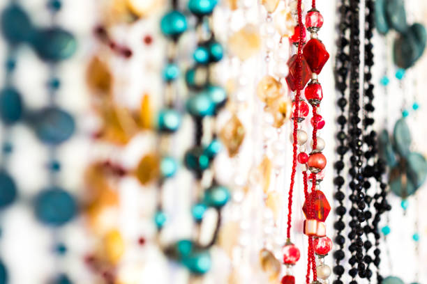 istock Hanging row of colourful beaded necklaces 978310678