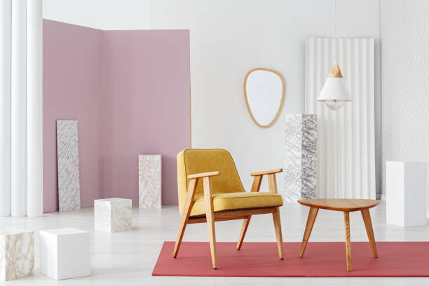 istock Mustard armchair by table 978321282