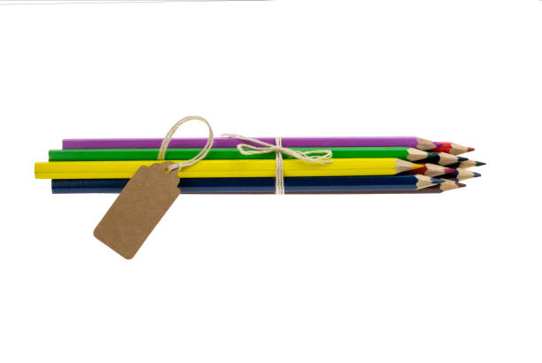 istock Color pencils isolated on white background with label. Close up 978339458