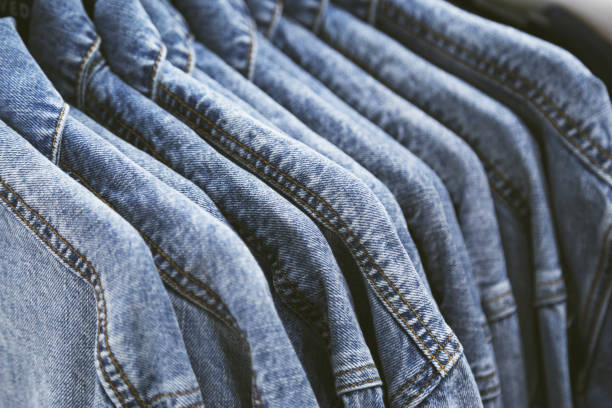istock fashion jeans jacket on hangers. 978346702