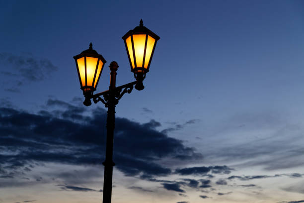 Street lantern against a dark blue night sky