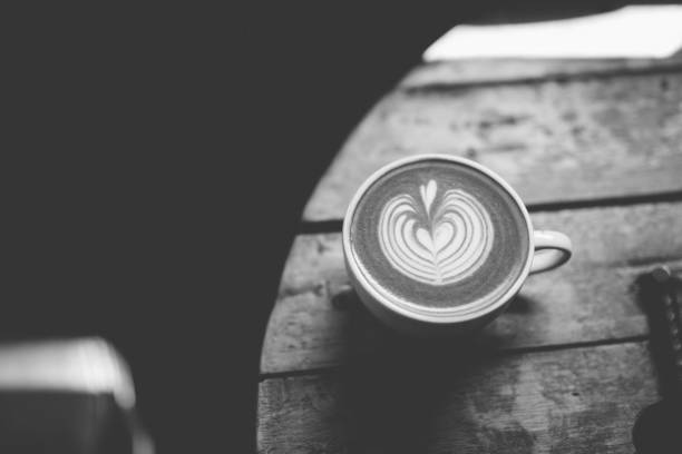 Cup of cappuccino on wooden table