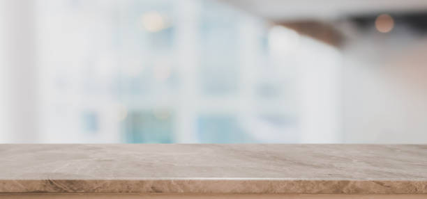 istock Empty stone table top on blurred with bokeh shopping mall background - can be used for display or montage your products 978357164