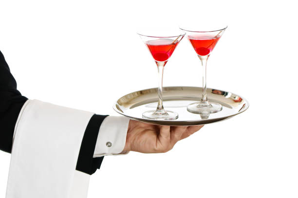 istock Waiter holding a tray with wine glasses 978363750