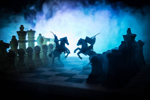 istock Medieval battle scene with cavalry and infantry on chessboard. Chess board game concept of business ideas and competition and strategy ideas Chess figures on a dark background 978364098