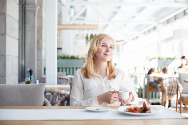 istock Beautiful young woman working in morning time 978364182