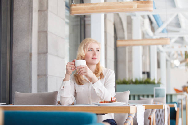 istock Beautiful young woman working in morning time 978364570