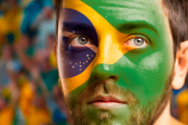 istock Man painted with Brazilian flag 978374564