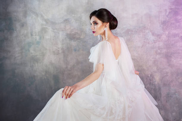istock Beautiful and stylish bride in wedding dress in Studio 978383050