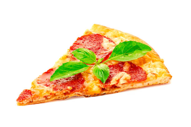 Piece of pepperoni pizza with basil leaves izolated on white background