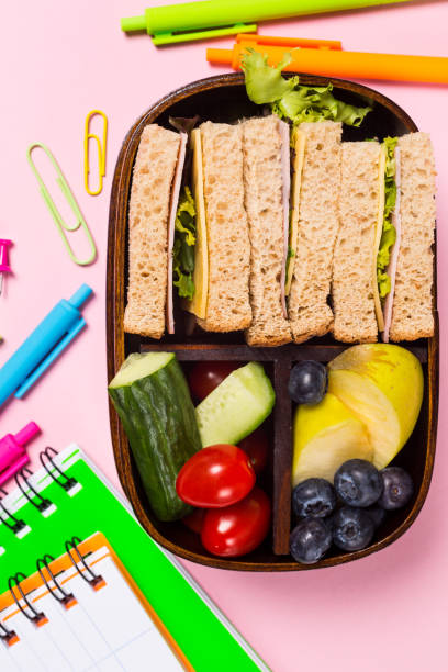 istock School wooden lunch box with sandwiches 978401516