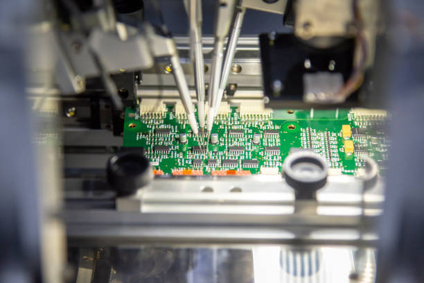 istock The production line of electronic board with microchip in the light blue scene. 978411054