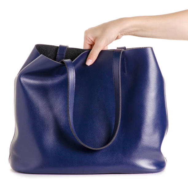 istock Blue leather female bag in hand 978411268