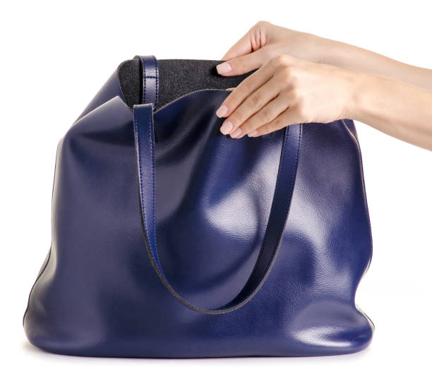 istock Blue leather female bag in hand 978411312