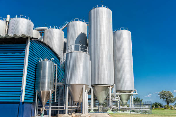 istock Beverage factory cylinders. With blue sky. 978416838