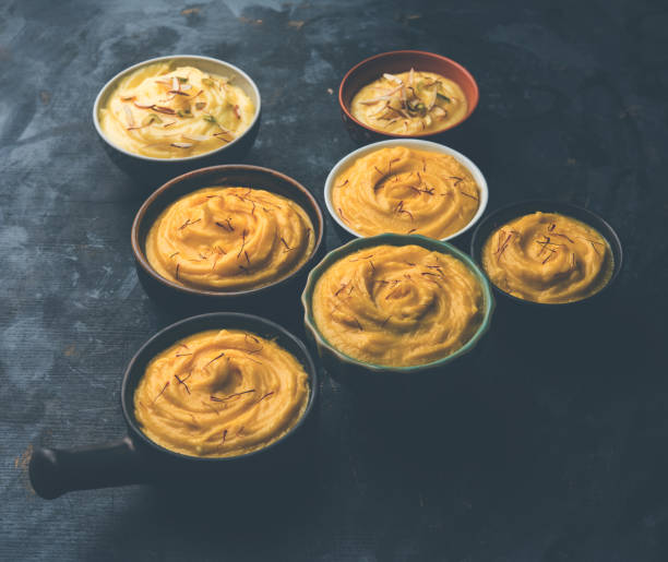 istock Shrikhand & Amrakhand served in different size bowl in group. Selective focus 978417228