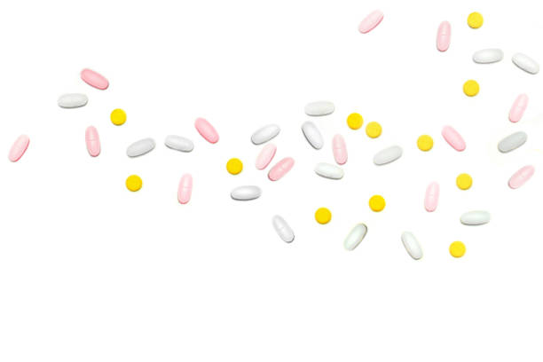 istock a lot of multicolored pills and tablets on the white background with copy space for text. 978423950