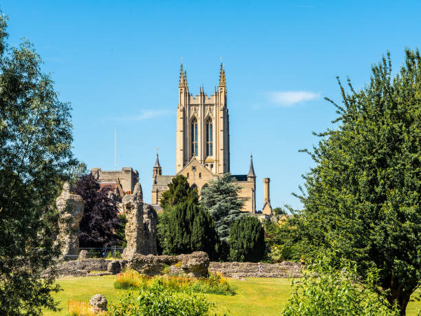 Bury St Edmunds Cathedral Daylight view of Bury St Edmunds Cathedral in Suffolk showing gardens bury st edmunds stock pictures, royalty-free photos & images