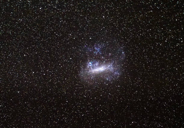 Long exposure of the night sky showing the Large Magellanic Cloud satellite galaxy and thousands of stars, as seen from the Wilsons Promontory National Park, Victoria, Australia.