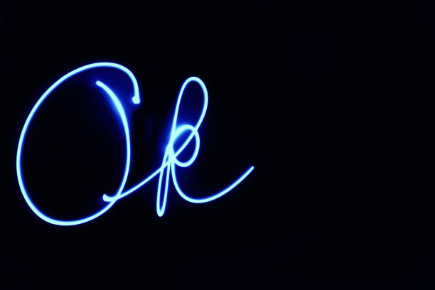 OK light painting word with blue light