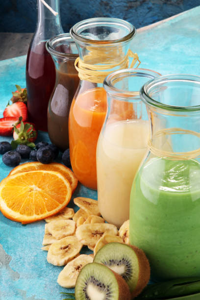 istock Selection of colorful smoothies on rustic background 978450058