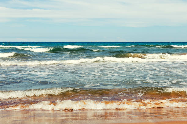 istock view of weaves from sea shore 978450452