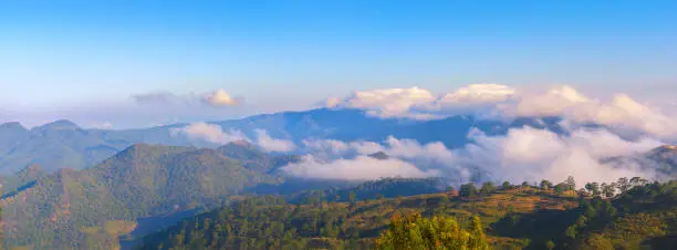 Photo of panorama of view on peak mountain natural beautiful landscape with sky on the vacation day on the morning with sunrise golden time.