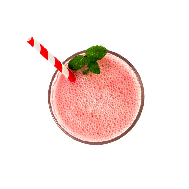 istock Strawberry milkshake in glass isolated on white background. Top view. 978477040