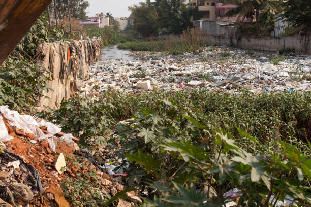 istock Big rubbish dump by the road at living area 978481534