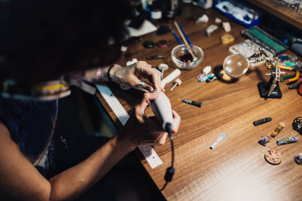 istock Woman making jewelry 978484044