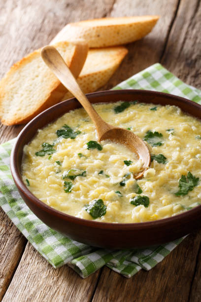 istock egg stracciatella with farfalline pasta and cheese close-up in a bowl. vertical 978486906