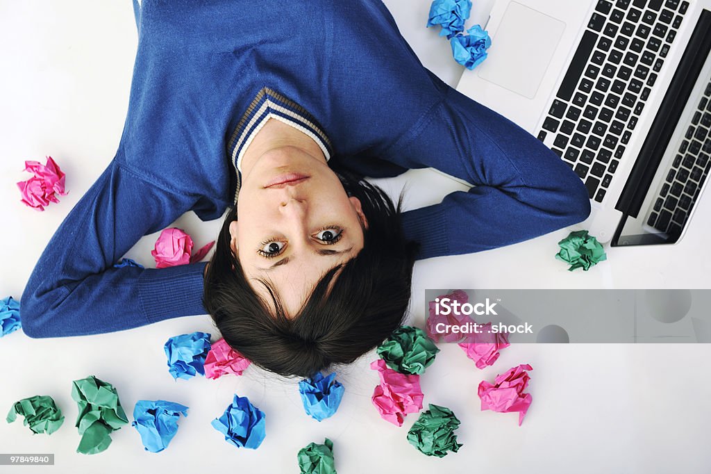 young woman isolated on white with colorful papers  Adult Stock Photo