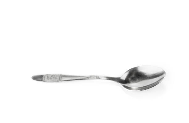 istock Soup spoon isolated in the white background 978498878