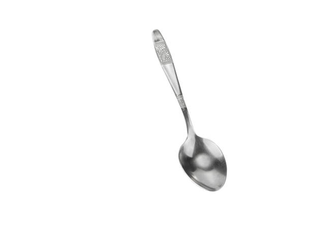 istock Soup spoon isolated in the white background 978498964
