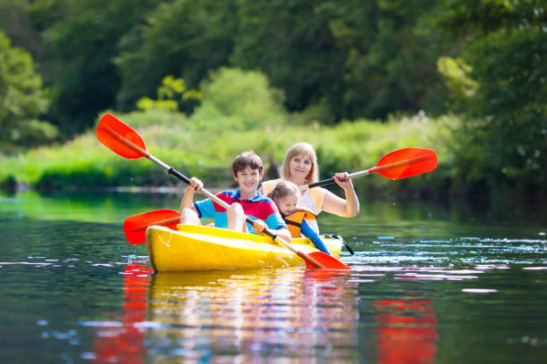 istock Child on kayak. Kids on canoe. Summer camping. 978499102