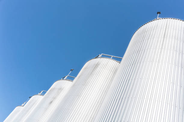 Beverage factory cylinders. With blue sky.
