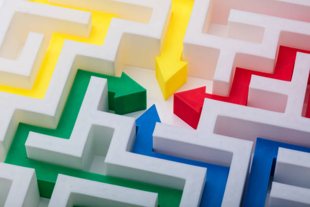 istock Multi Colored Arrows In The Centre Of Maze 978520248