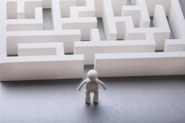 istock Human Figure Standing Outside Maze Entrance 978520292