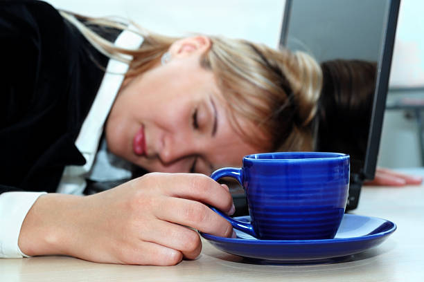 istock Tired woman are sleeping near laptop 97852242
