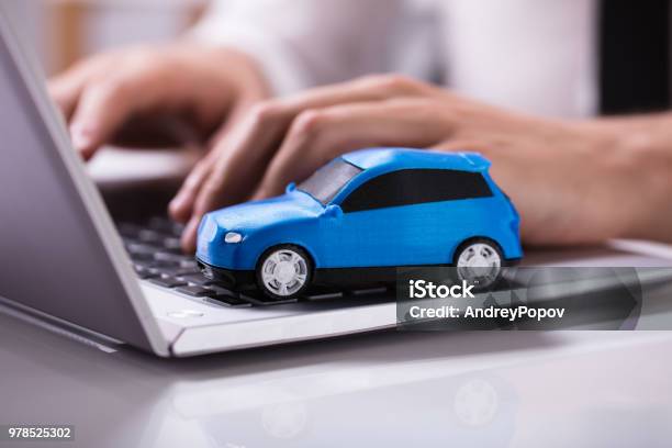 Blue Car On Laptop Keypad Stock Photo - Download Image Now - Car, Internet, Insurance